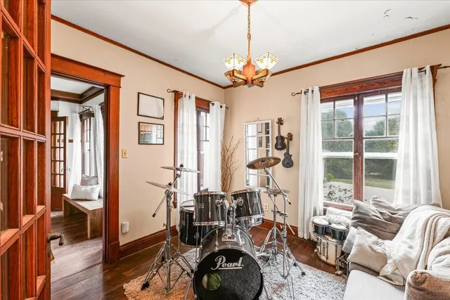 a view of a livingroom with furniture and windows