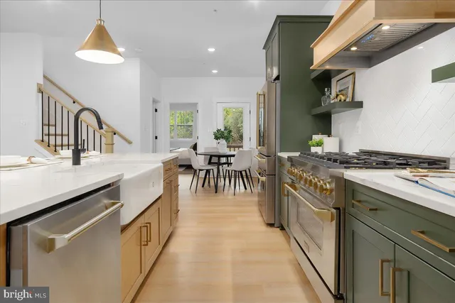 a kitchen with counter top space and a sink