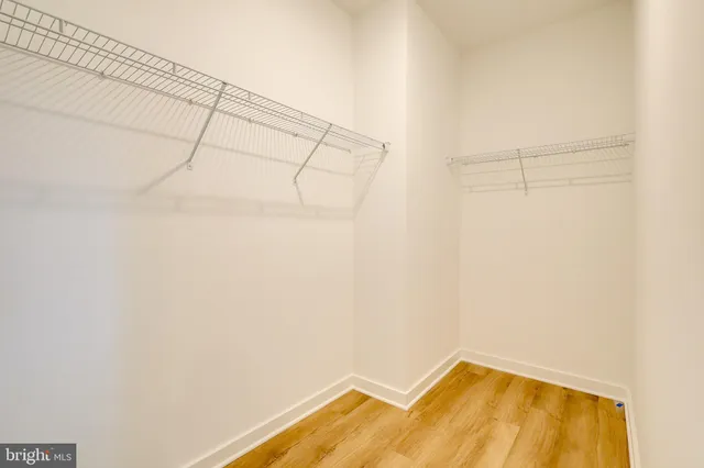 a bathroom with a double vanity sink mirror and double