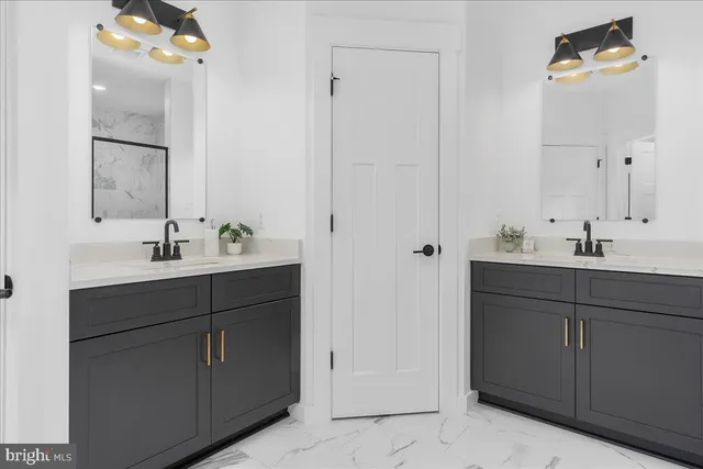 a bathroom with a bathtub and shower