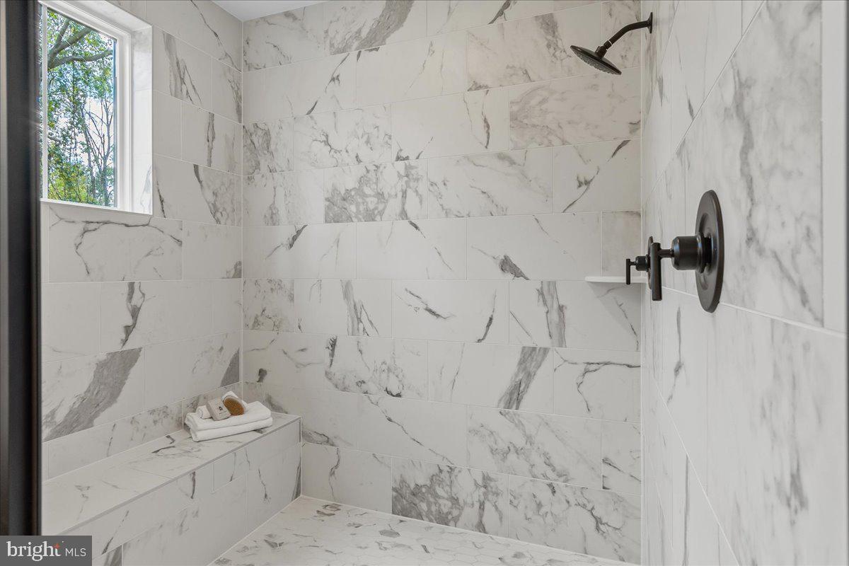 14 Stouffer Avenue Boonsboro, MD 21713 - Photo 24 of 40 a bathroom with a bathtub and shower