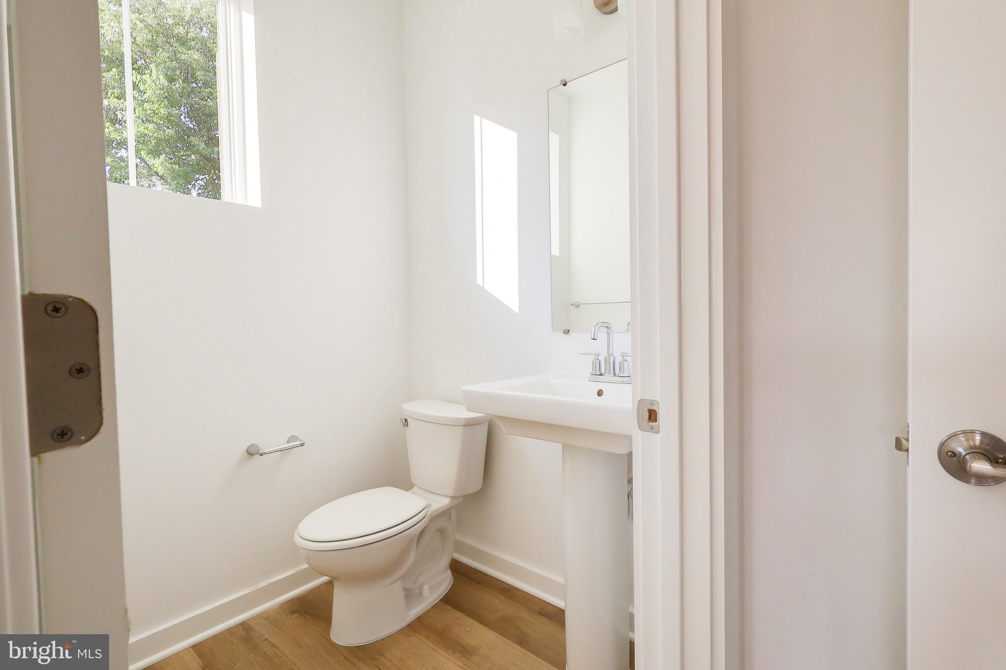 14 Stouffer Avenue Boonsboro, MD 21713 - Photo 27 of 40 a bathroom with a toilet a sink and a window