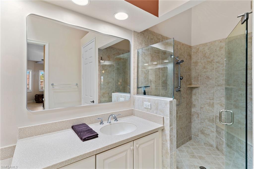 6417 Legacy Circle, Unit 1504 Naples, FL 34113 - Photo 25 of 50 Primary Ensuite Bath