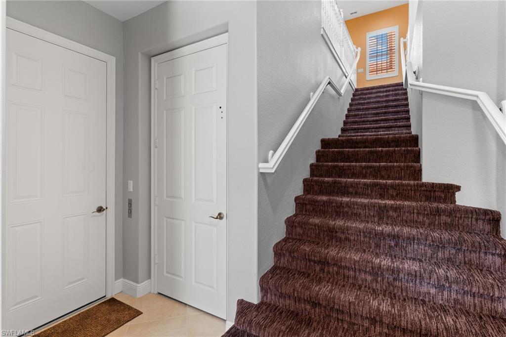 6417 Legacy Circle, Unit 1504 Naples, FL 34113 - Photo 36 of 49 a view of entryway with stairs