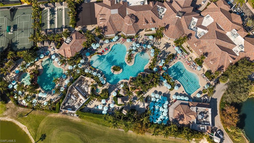 6417 Legacy Circle, Unit 1504 Naples, FL 34113 - Photo 48 of 49 an aerial view of residential houses with outdoor space