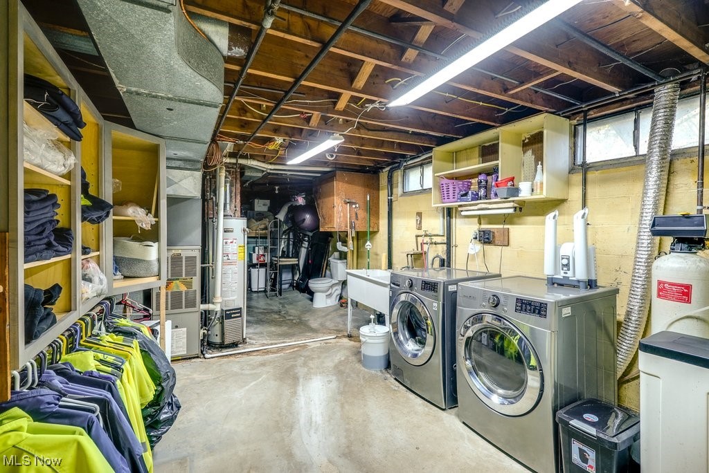 333 East Caston Road Akron, OH 44319 - Photo 29 of 42 Basement featuring gas water heater and washer and dryer
