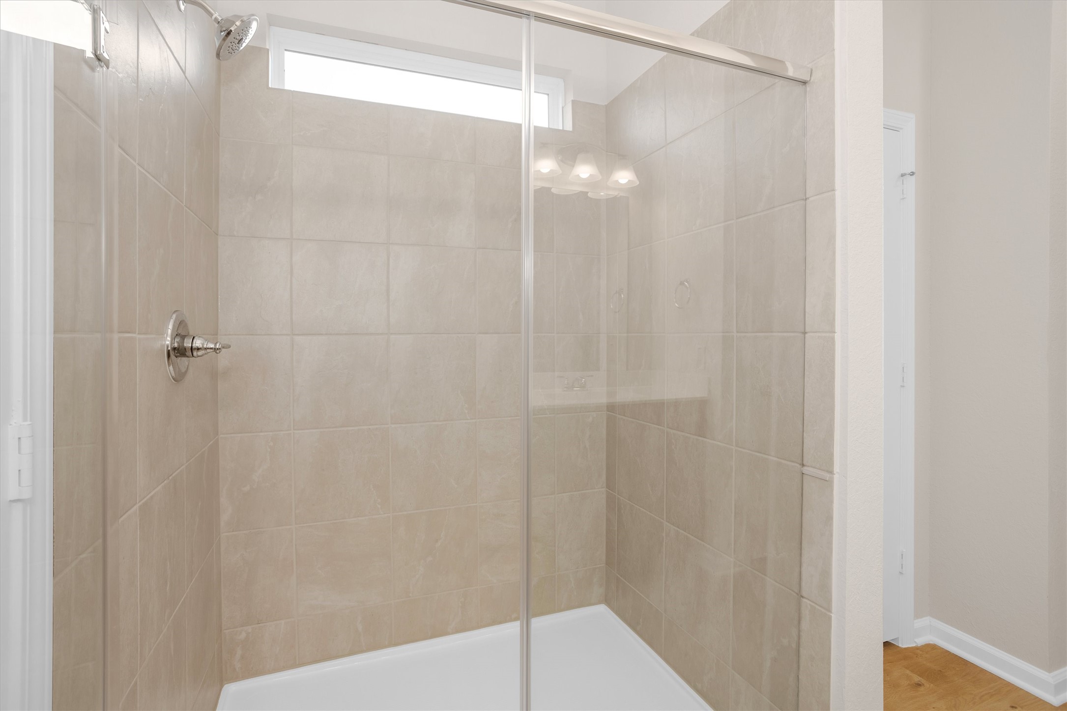 9749 Enclave Ridge Road Willis, TX 77318 - Photo 16 of 29 Primary bath with walk in closet and walk in shower.