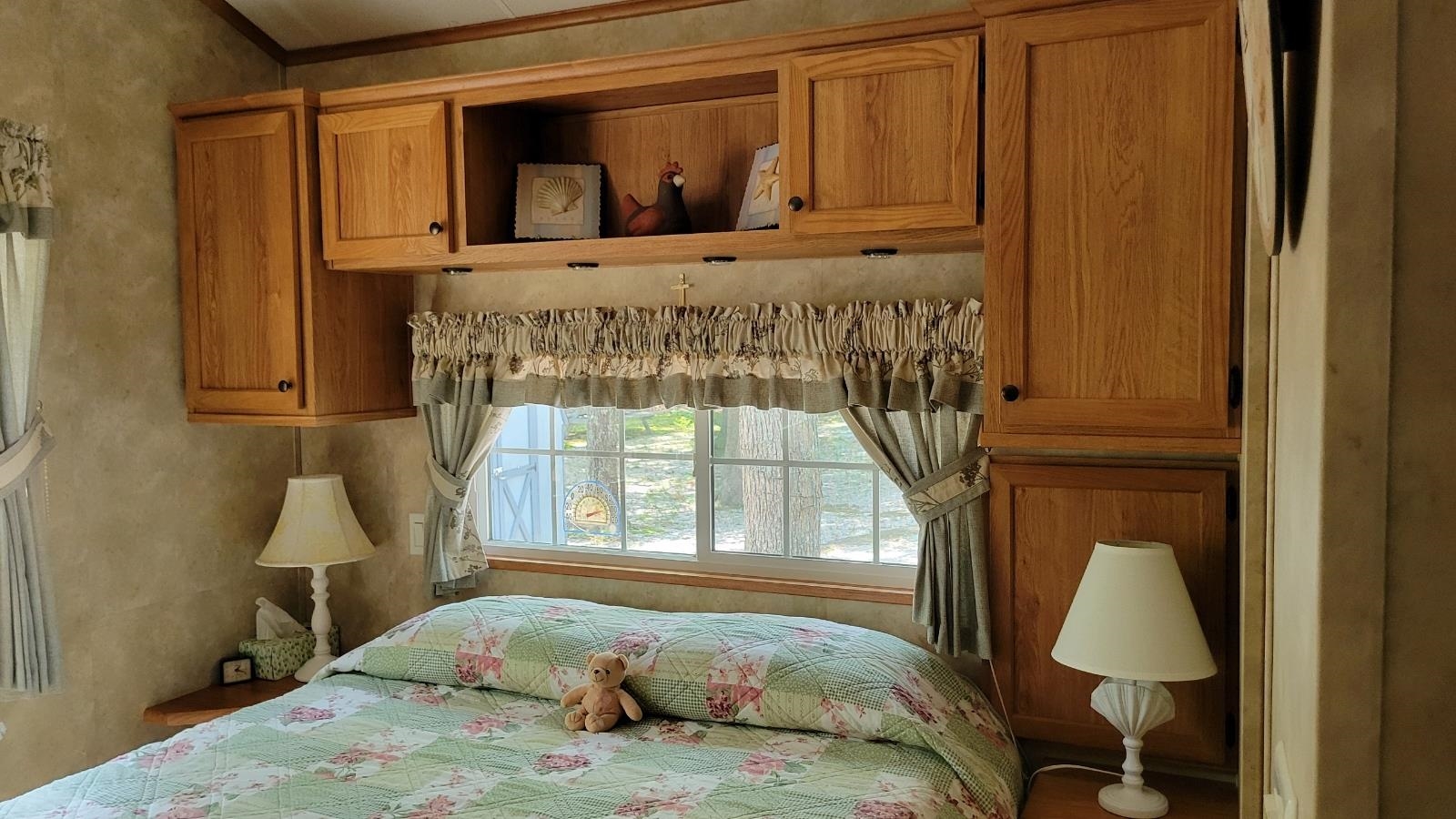 561 Corsons Tavern Road Ocean View, NJ 08230 - Photo 18 of 31 a bedroom with a bed and a window