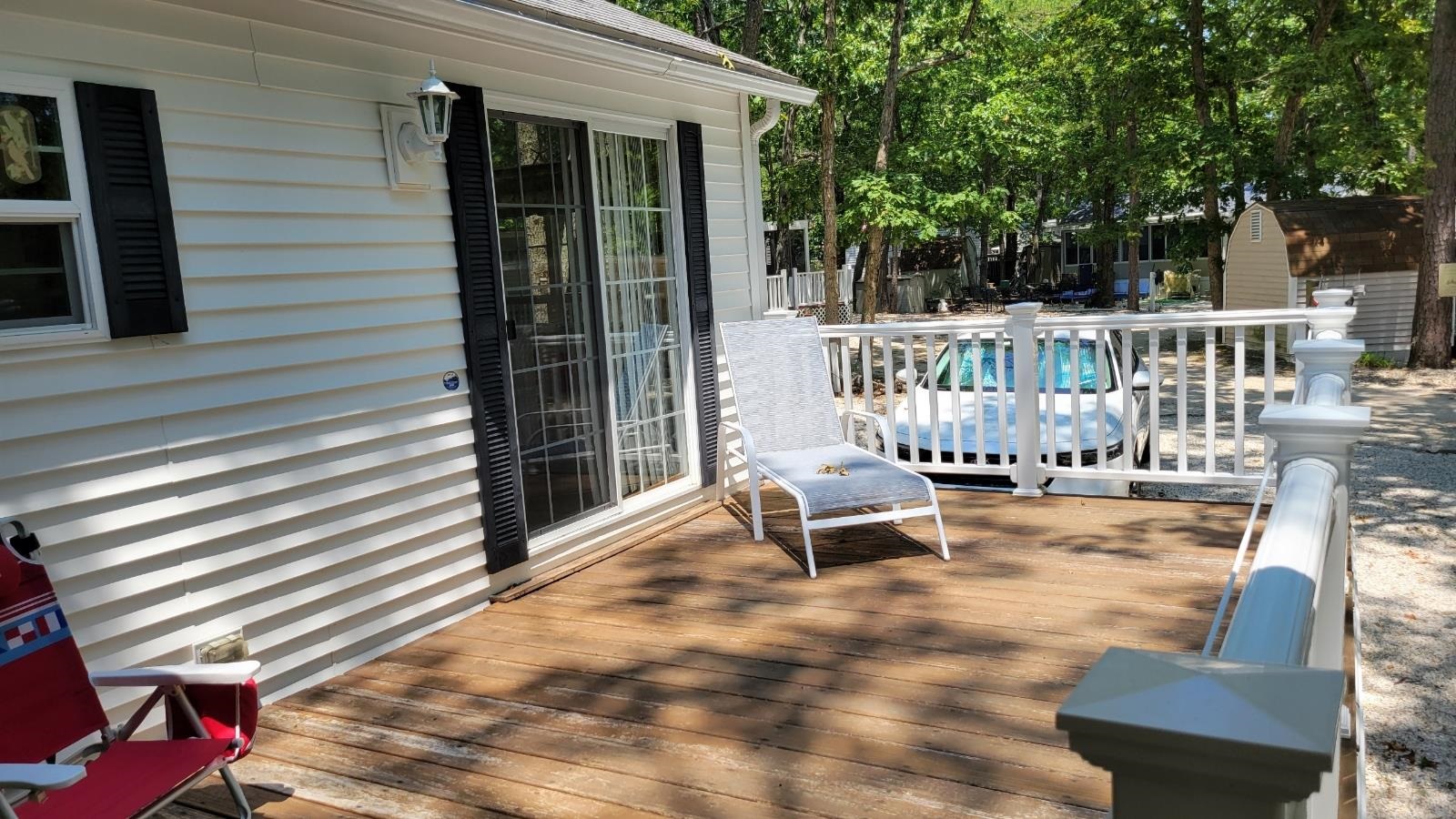 561 Corsons Tavern Road Ocean View, NJ 08230 - Photo 26 of 31 a view of a patio with a table and chairs