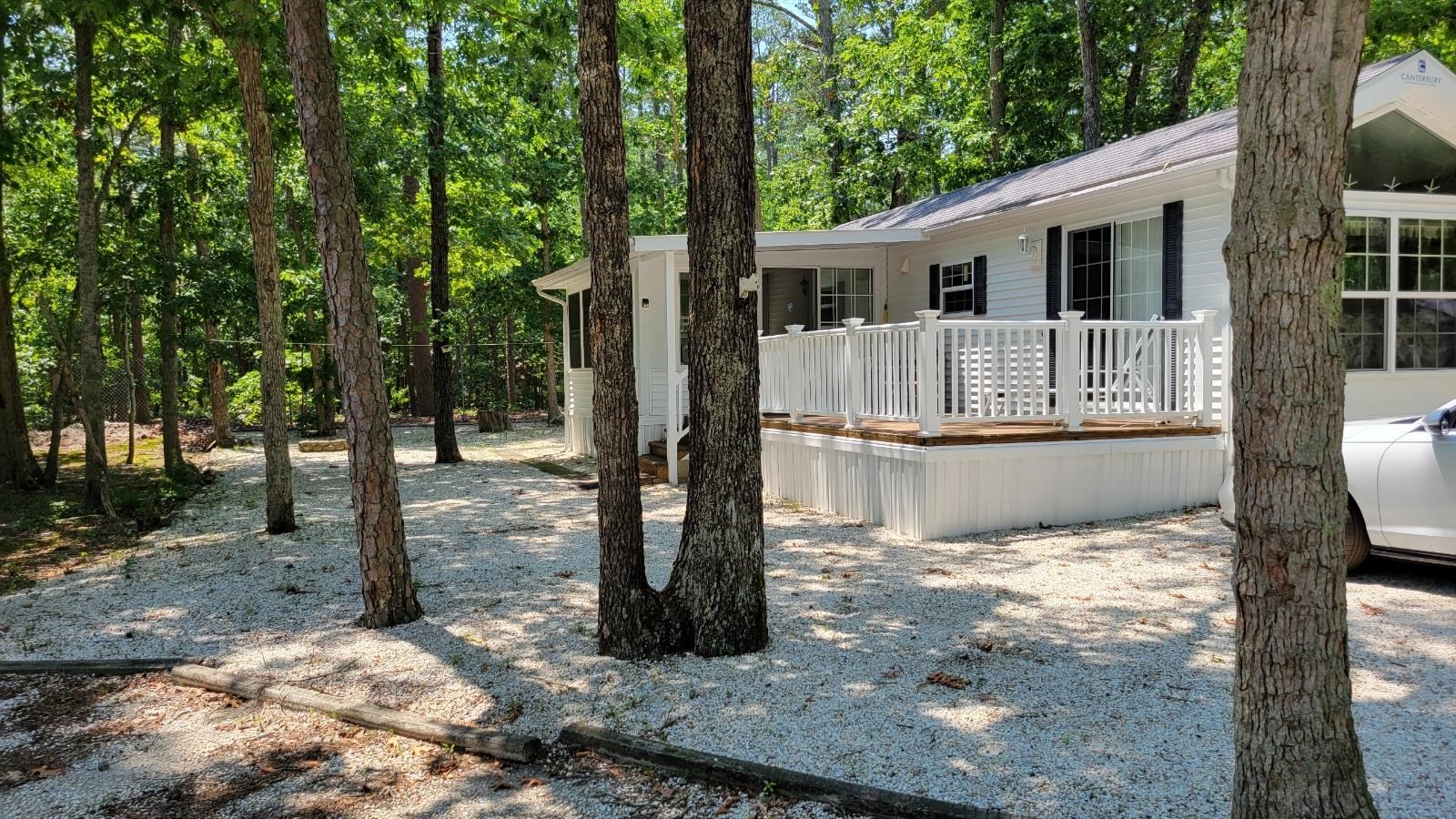 561 Corsons Tavern Road Ocean View, NJ 08230 - Photo 28 of 31 a view of a house with backyard