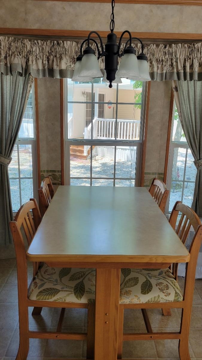 561 Corsons Tavern Road Ocean View, NJ 08230 - Photo 9 of 31 a view of a balcony and car parked