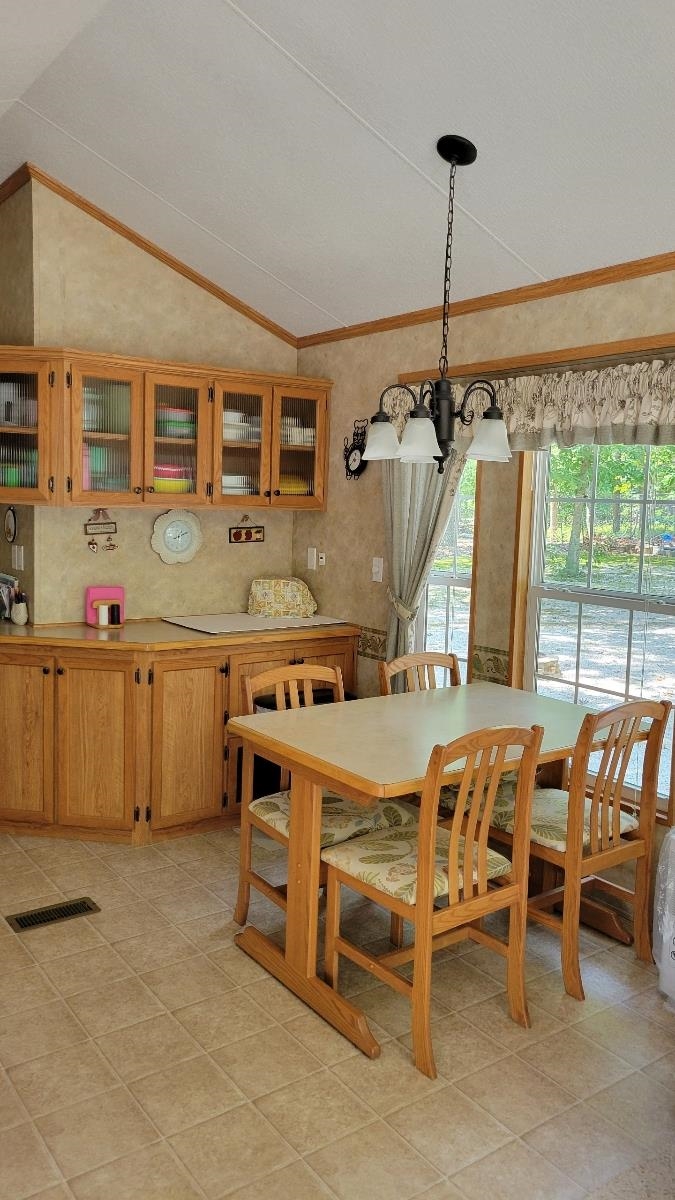 561 Corsons Tavern Road Ocean View, NJ 08230 - Photo 10 of 31 a dining room with furniture and window