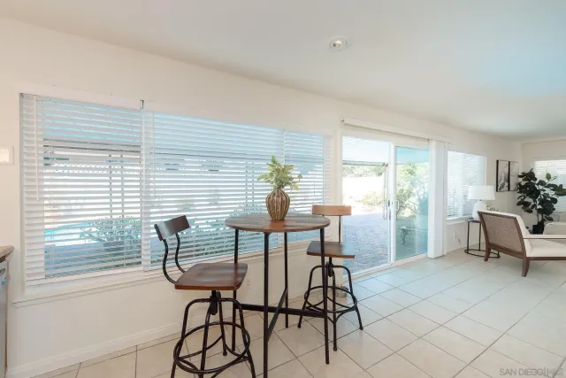 a view of a livingroom with furniture and window