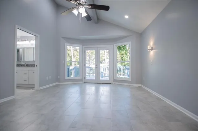 a bathroom with a sink a vanity and a mirror