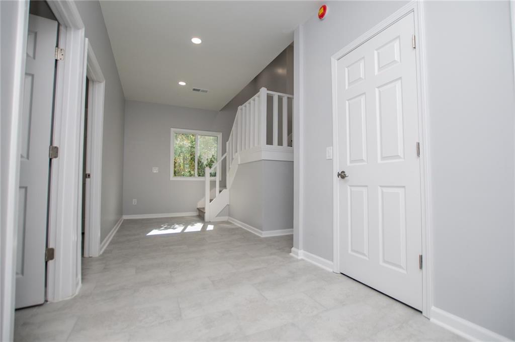 1039 Monticello Drive Villa Rica, GA 30180 - Photo 43 of 96 a view of an empty room with a window