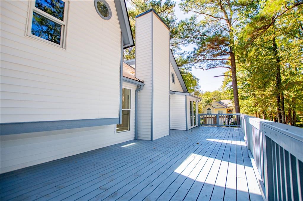 1039 Monticello Drive Villa Rica, GA 30180 - Photo 73 of 96 a view of outdoor space with deck and hardwood