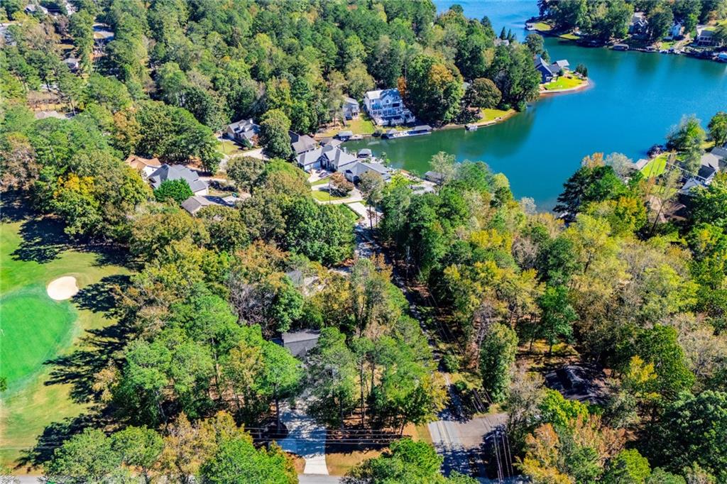 1039 Monticello Drive Villa Rica, GA 30180 - Photo 91 of 96 an aerial view of a houses with a yard and swimming pool