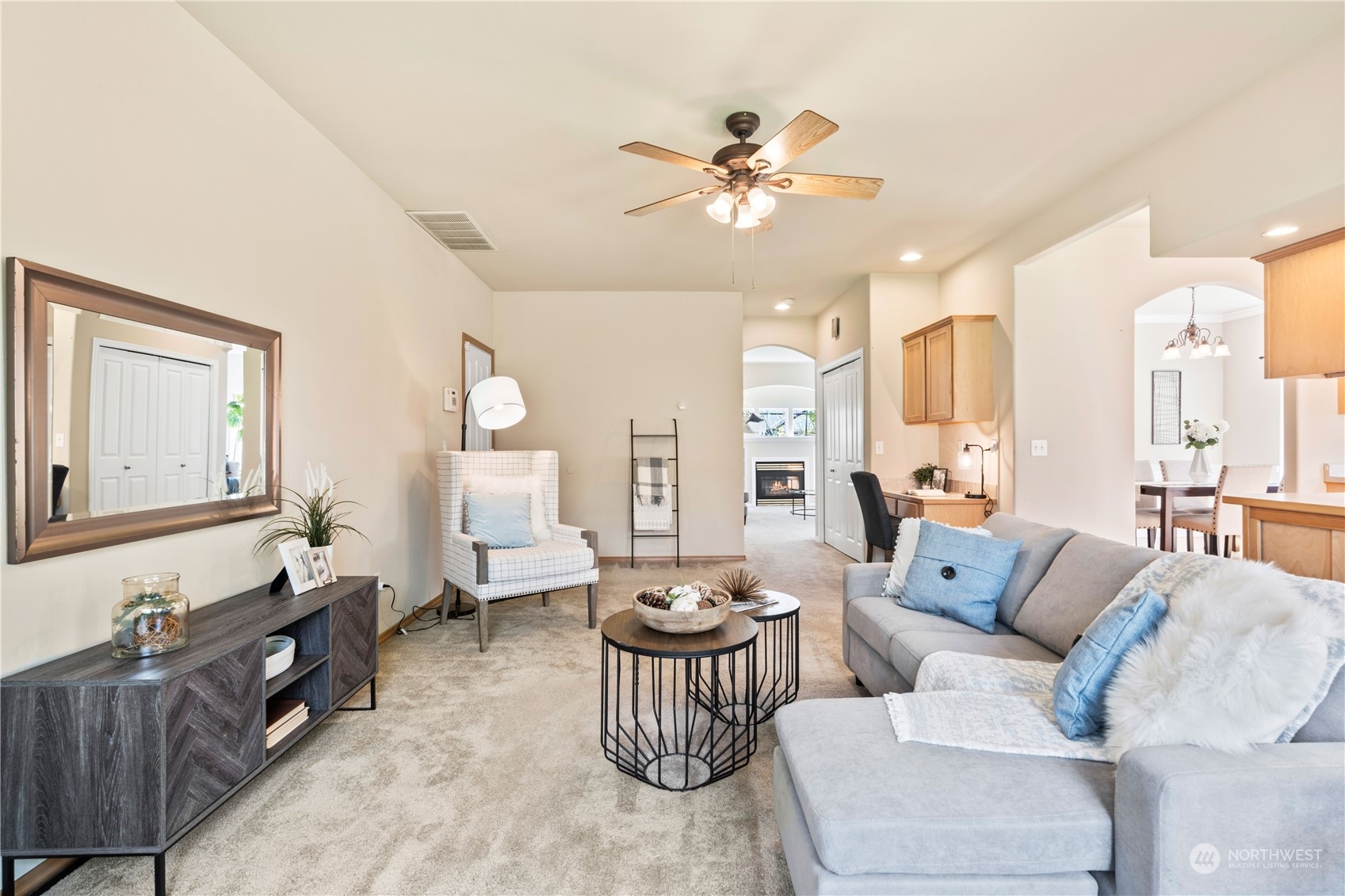 218 170th Place Southeast Bothell, WA 98012 - Photo 16 of 29 a living room with furniture and a large mirror