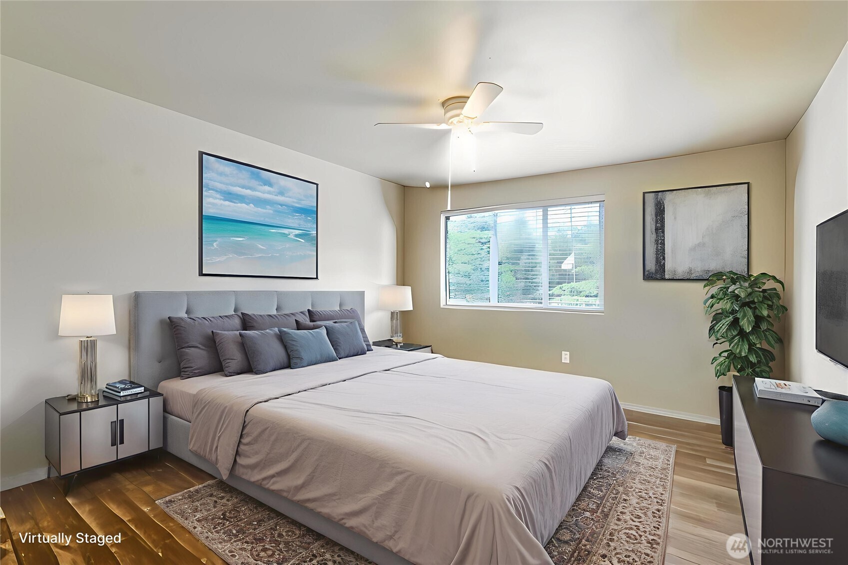 2219 Key Peninsula Highway Southwest Lakebay, WA 98349 - Photo 19 of 40 a bedroom with a large bed and a window