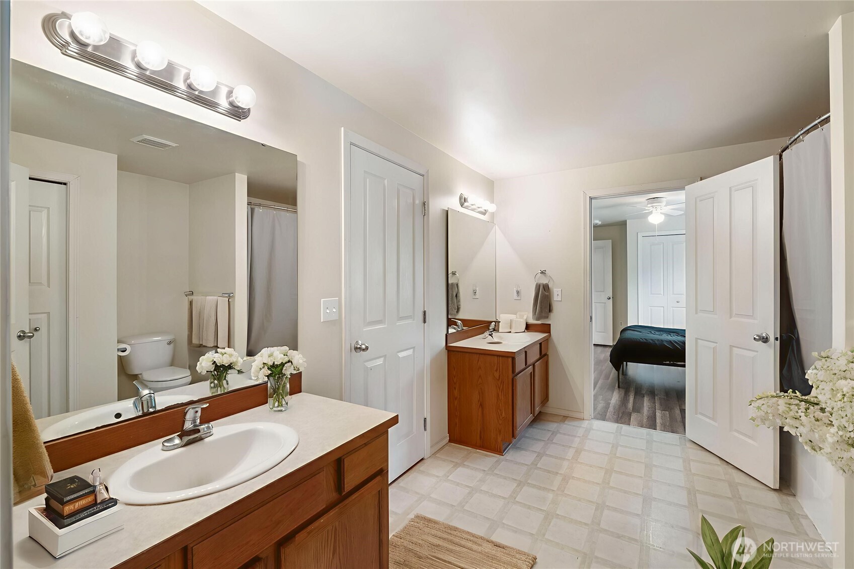 2219 Key Peninsula Highway Southwest Lakebay, WA 98349 - Photo 20 of 40 a spacious bathroom with a sink double vanity and a mirror