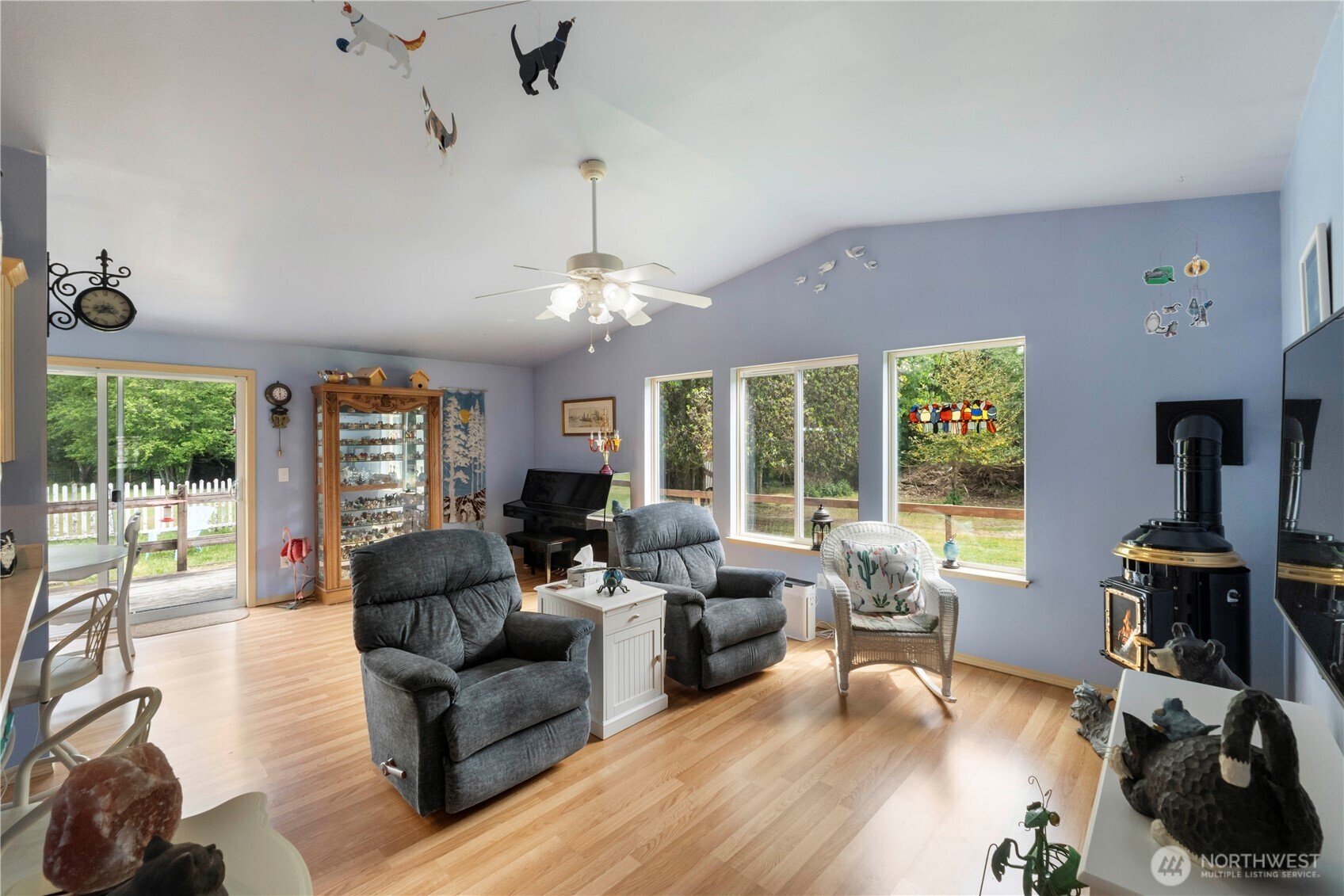 2219 Key Peninsula Highway Southwest Lakebay, WA 98349 - Photo 28 of 40 a living room with furniture and a flat screen tv
