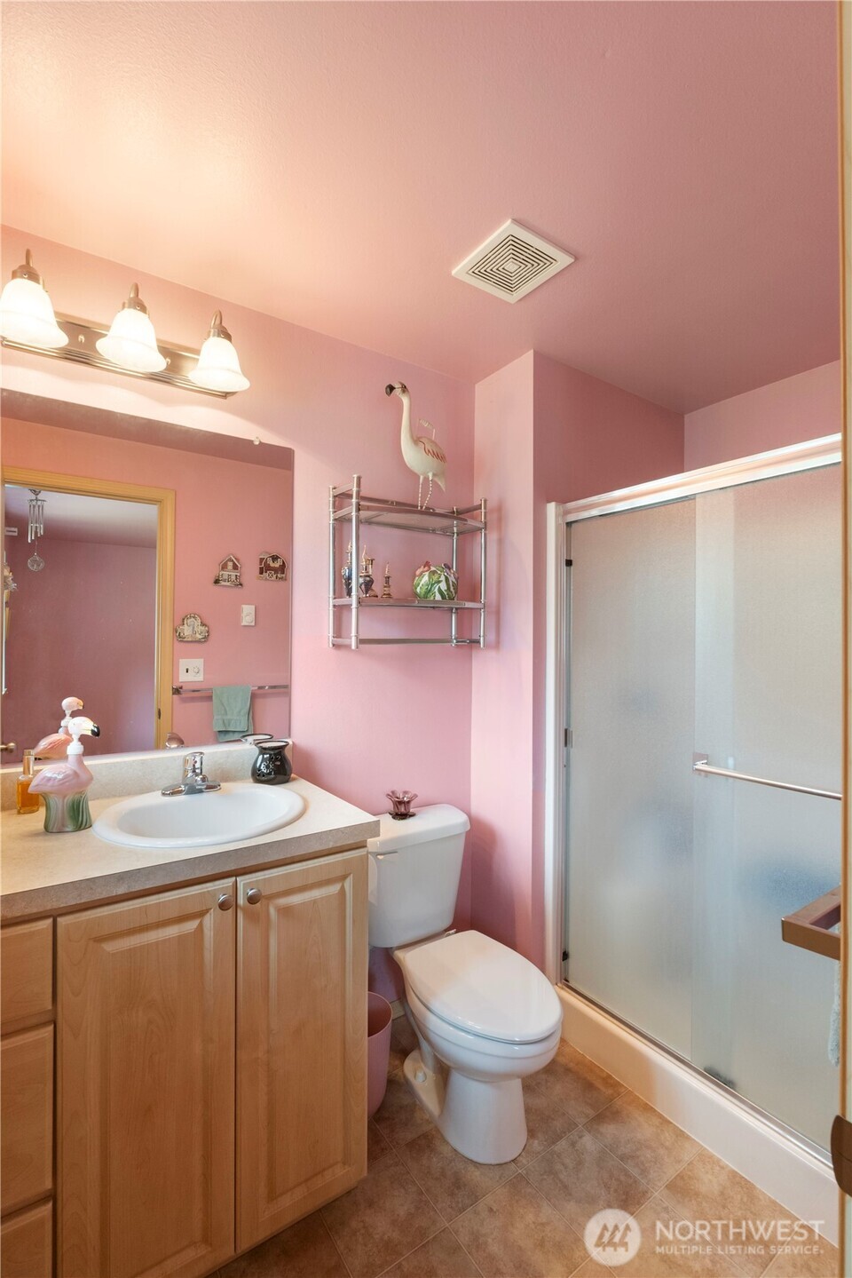 2219 Key Peninsula Highway Southwest Lakebay, WA 98349 - Photo 31 of 40 a bathroom with a sink a toilet and shower