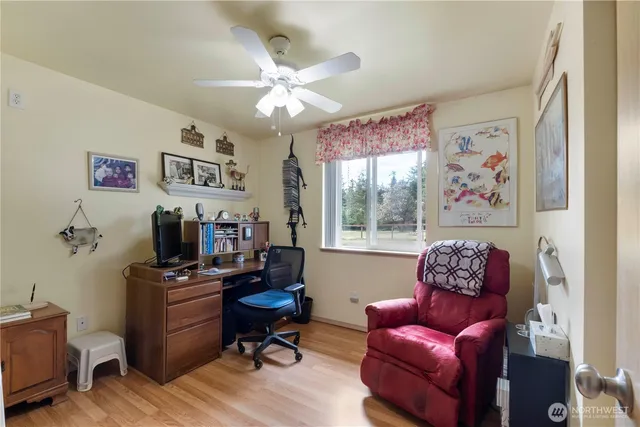 a workspace with furniture and a window