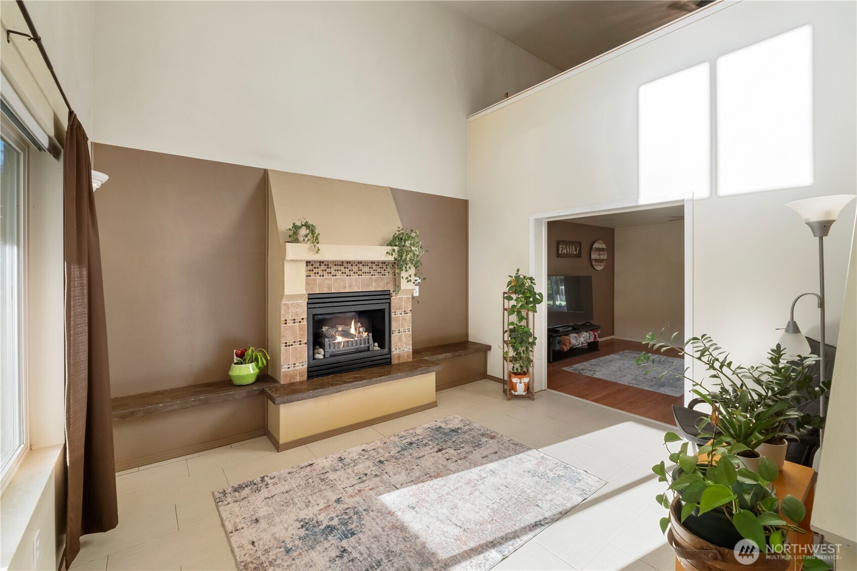 2219 Key Peninsula Highway Southwest Lakebay, WA 98349 - Photo 8 of 40 a living room with furniture and a fireplace