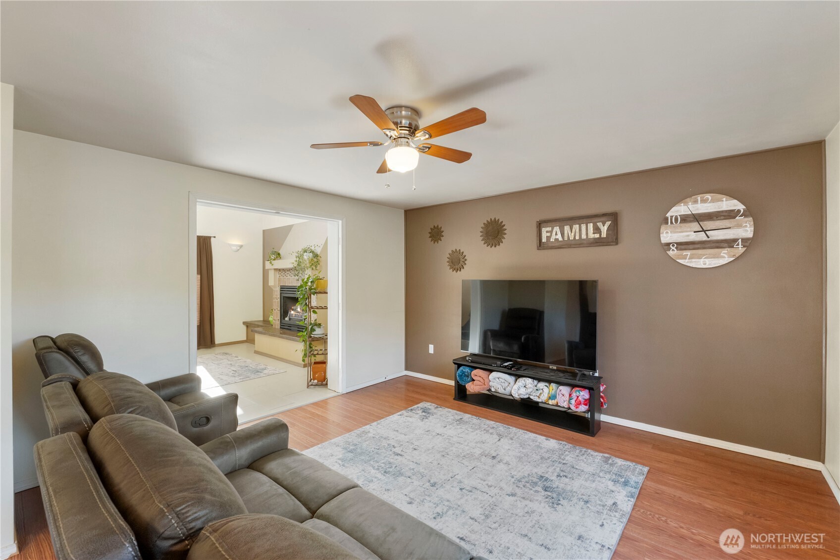 2219 Key Peninsula Highway Southwest Lakebay, WA 98349 - Photo 10 of 40 a living room with furniture and a flat screen tv