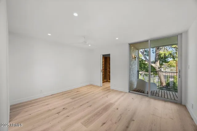 a view of entryway with wooden floor