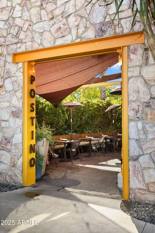 a view of yard with patio