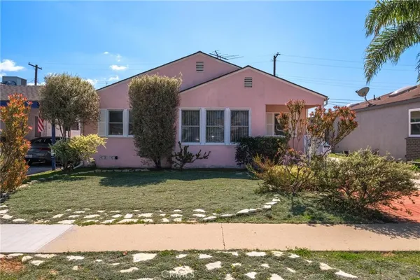 a view of a house with a garden