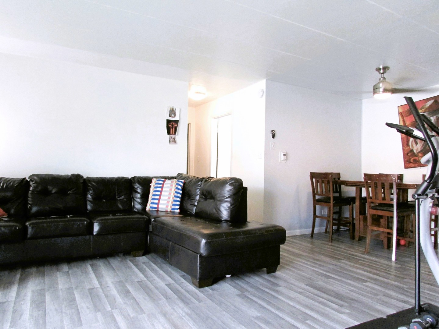 10611 Parkside Avenue, Unit 202 Chicago Ridge, IL 60415 - Photo 11 of 22 a living room with furniture and wooden floor