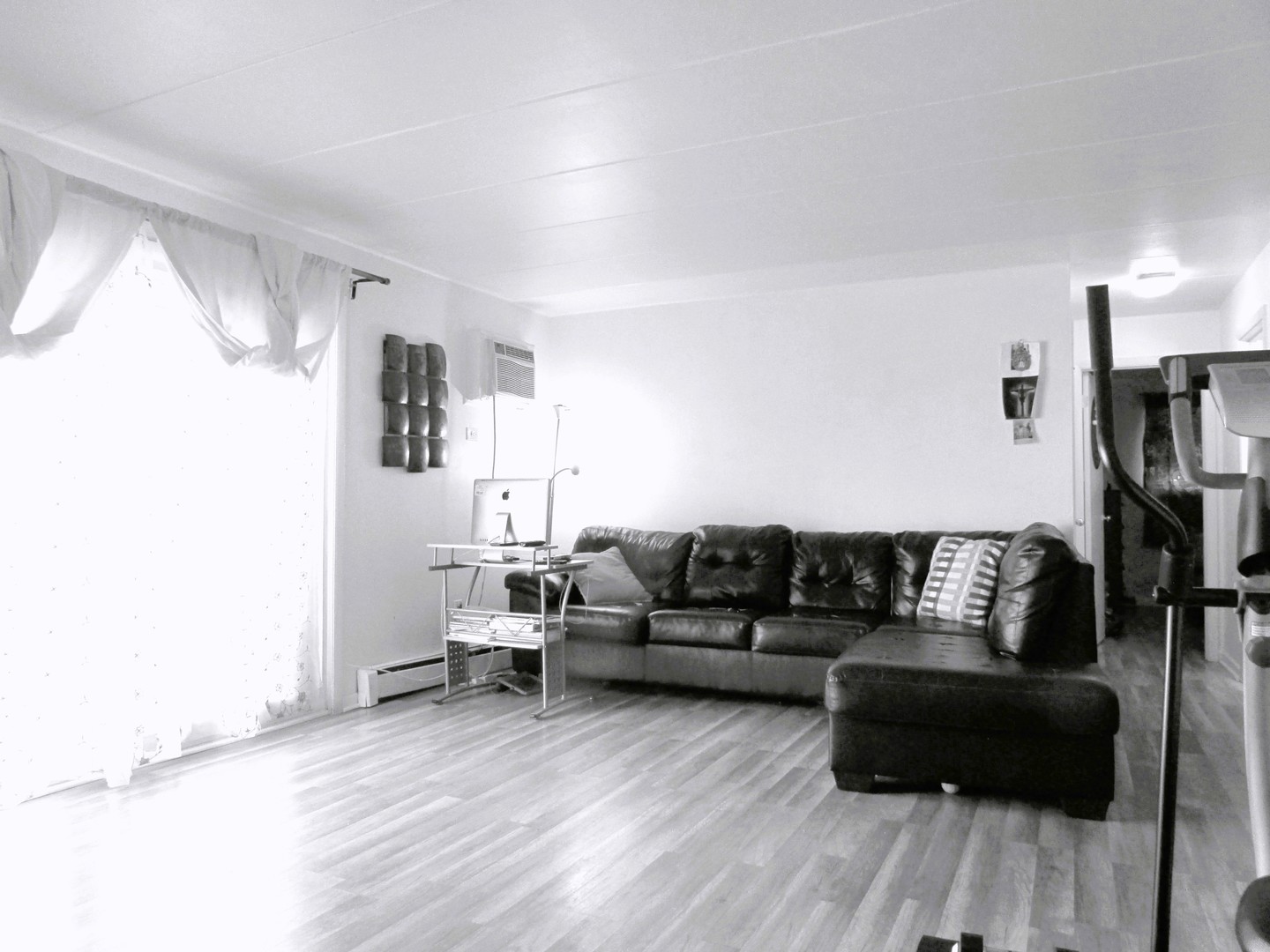 10611 Parkside Avenue, Unit 202 Chicago Ridge, IL 60415 - Photo 12 of 22 a living room with furniture and a wooden floor