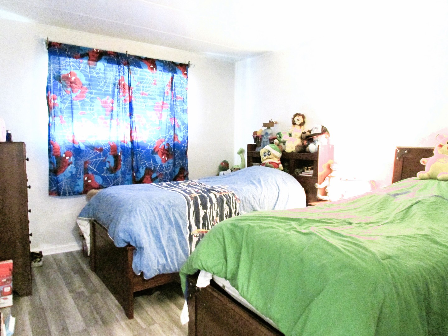 10611 Parkside Avenue, Unit 202 Chicago Ridge, IL 60415 - Photo 16 of 22 a bedroom with a bed and a window