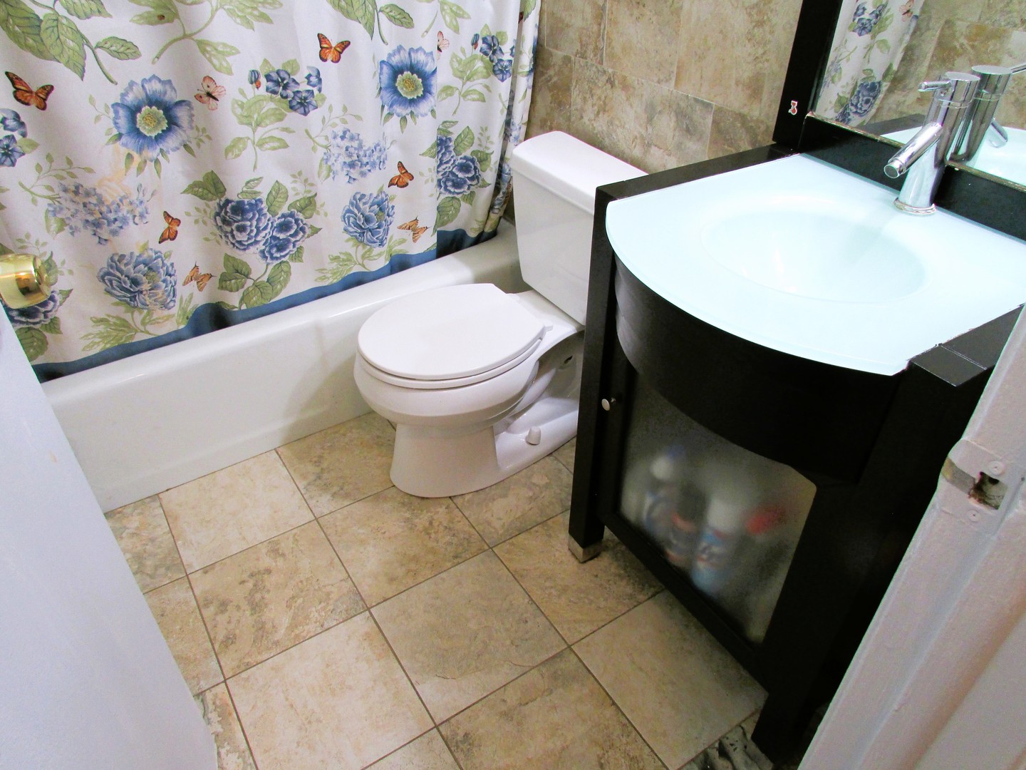 10611 Parkside Avenue, Unit 202 Chicago Ridge, IL 60415 - Photo 17 of 22 a bathroom with a toilet and a sink