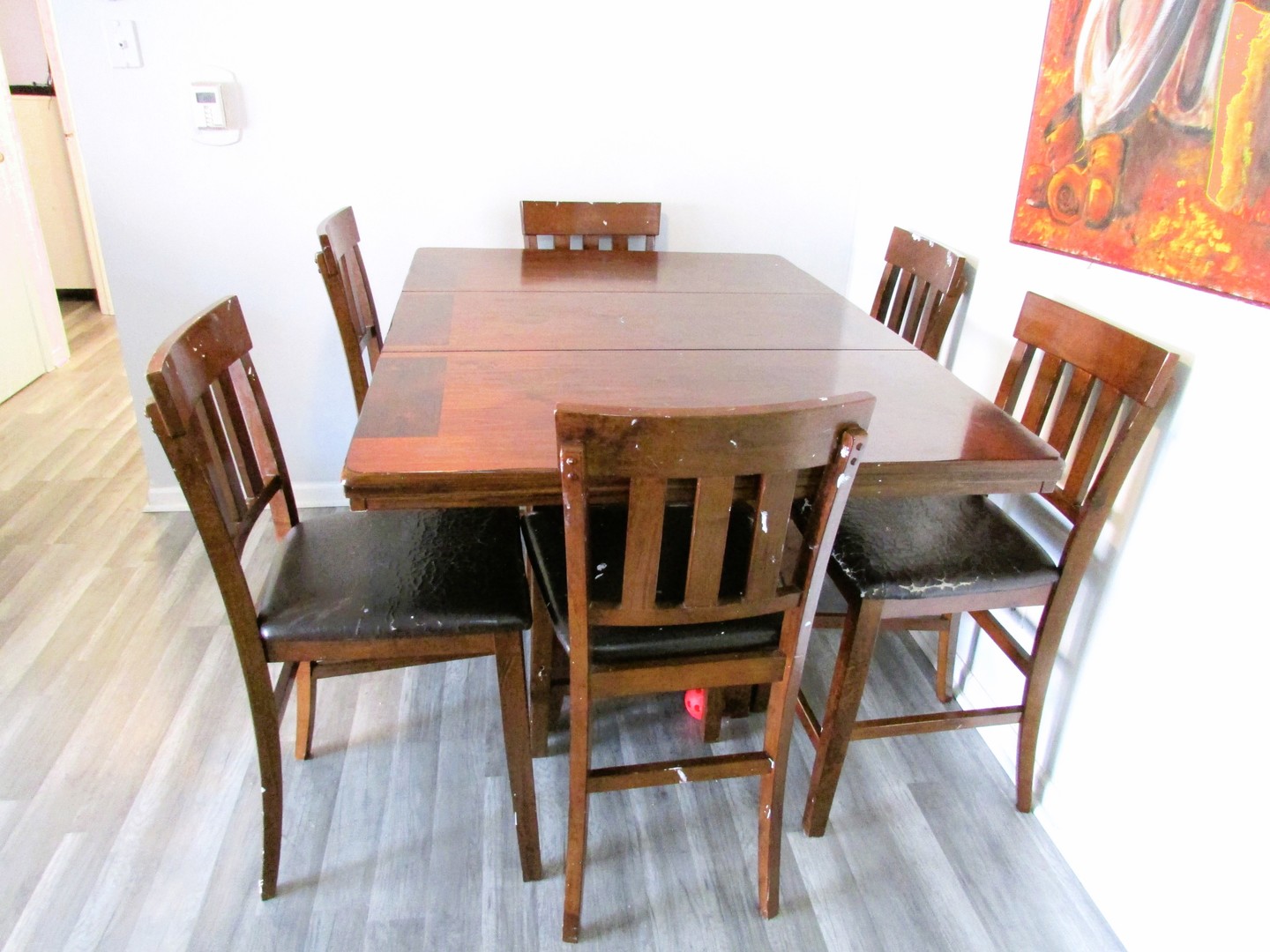 10611 Parkside Avenue, Unit 202 Chicago Ridge, IL 60415 - Photo 8 of 22 a view of a dining room with furniture and wooden floor