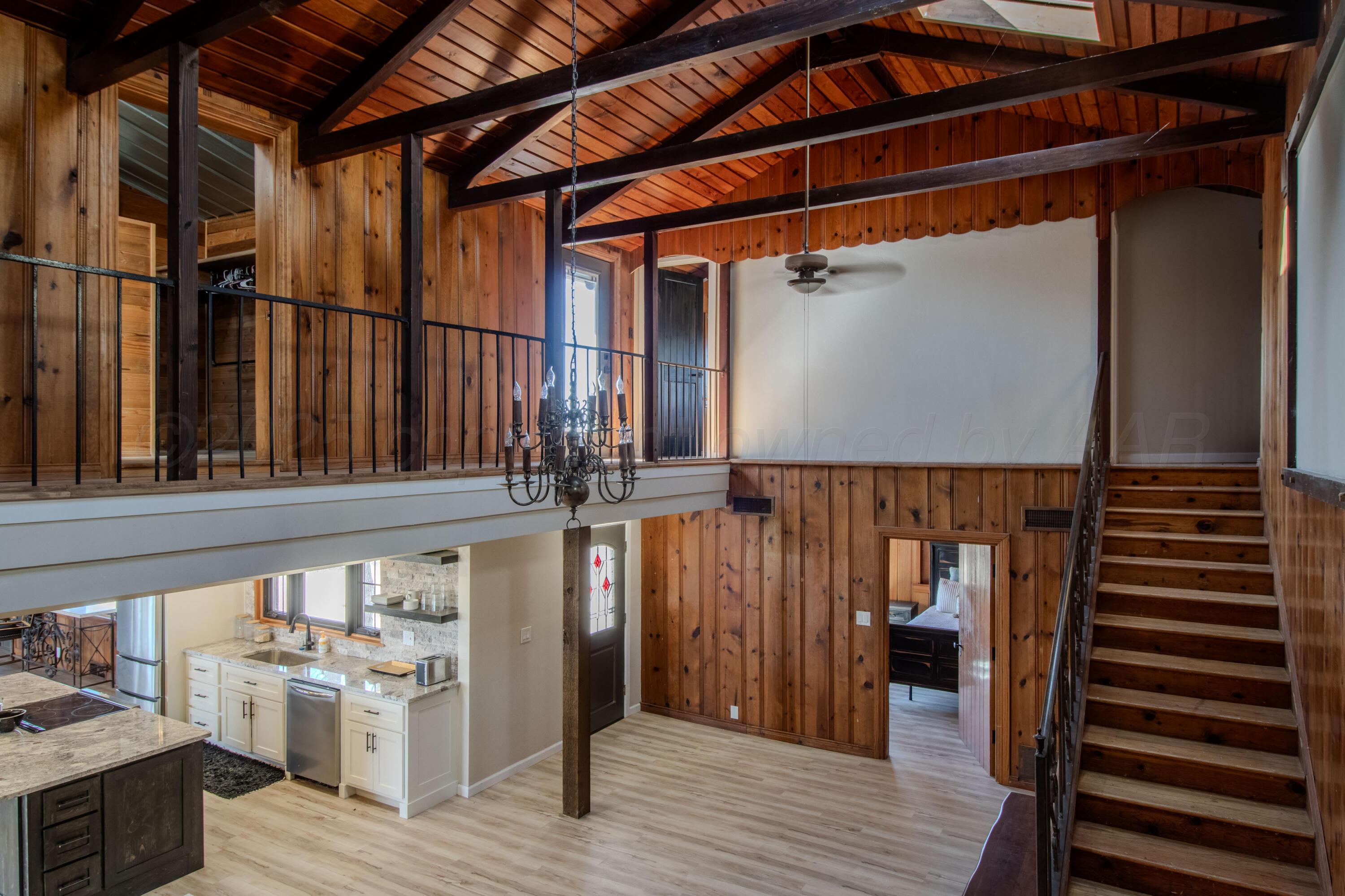 401 10 Bears Trail Howardwick, TX 79226 - Photo 16 of 71 a view of a balcony with wooden floor