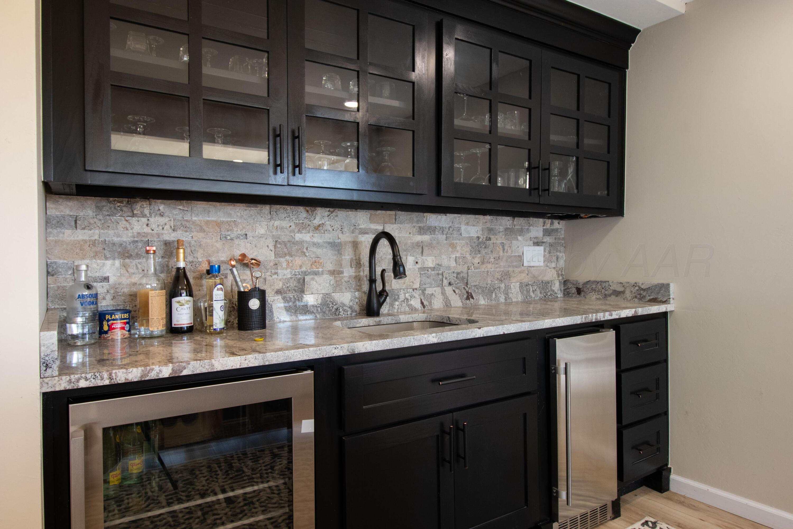 401 10 Bears Trail Howardwick, TX 79226 - Photo 19 of 71 a kitchen with stainless steel appliances granite countertop a sink and cabinets