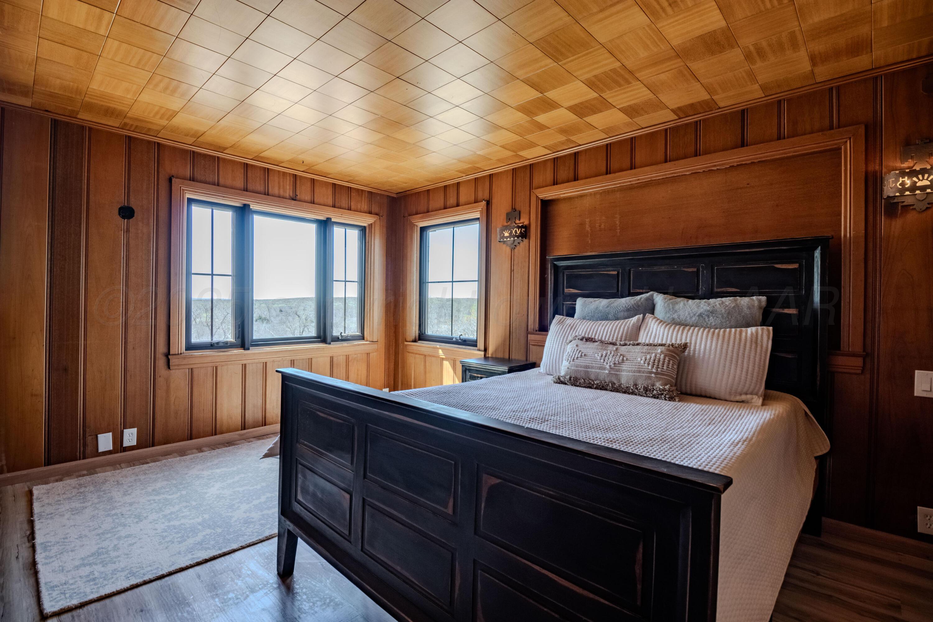 401 10 Bears Trail Howardwick, TX 79226 - Photo 26 of 71 a bed sitting in a bedroom next to a window