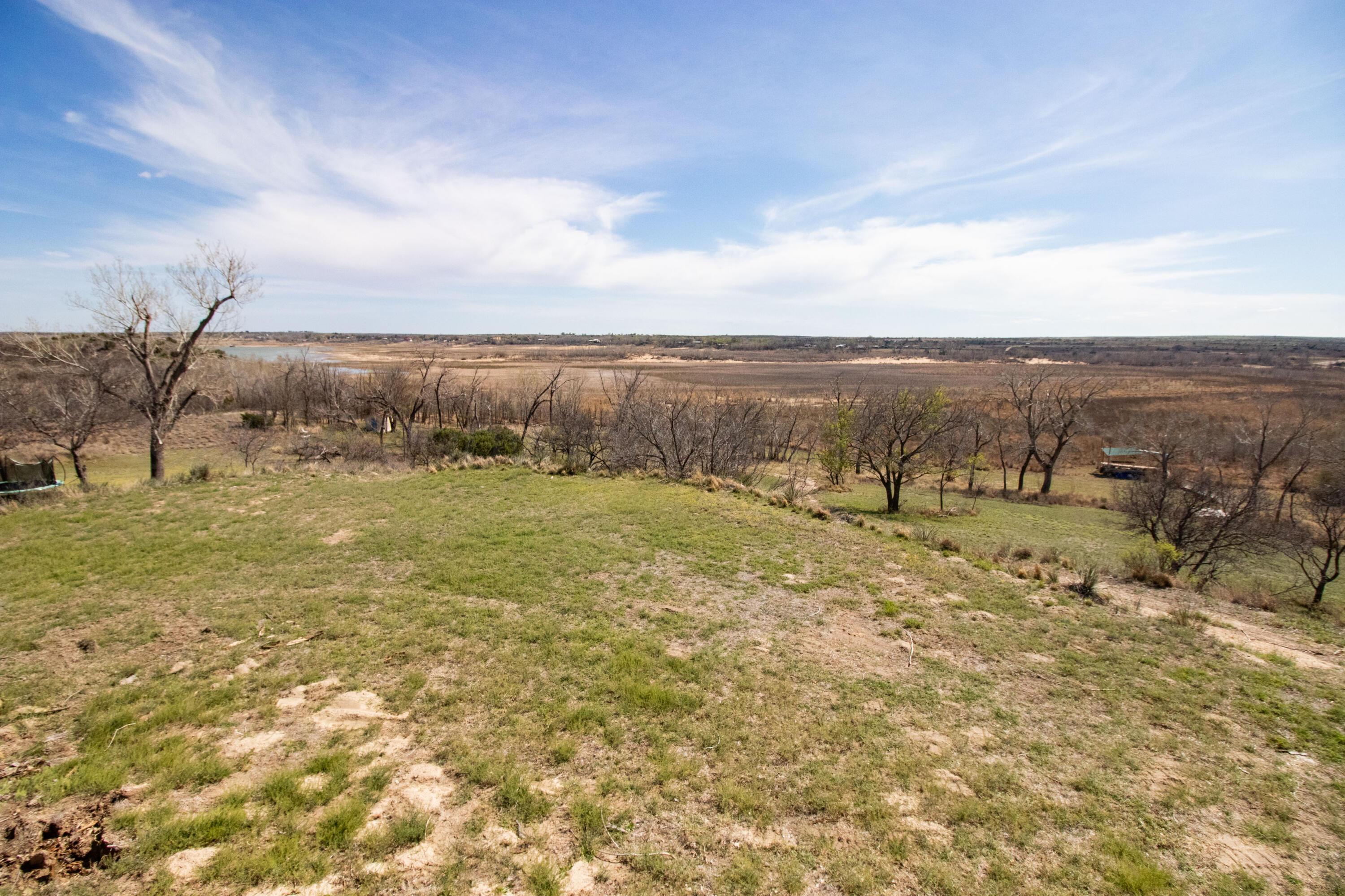 401 10 Bears Trail Howardwick, TX 79226 - Photo 45 of 71 a view of a field with an ocean
