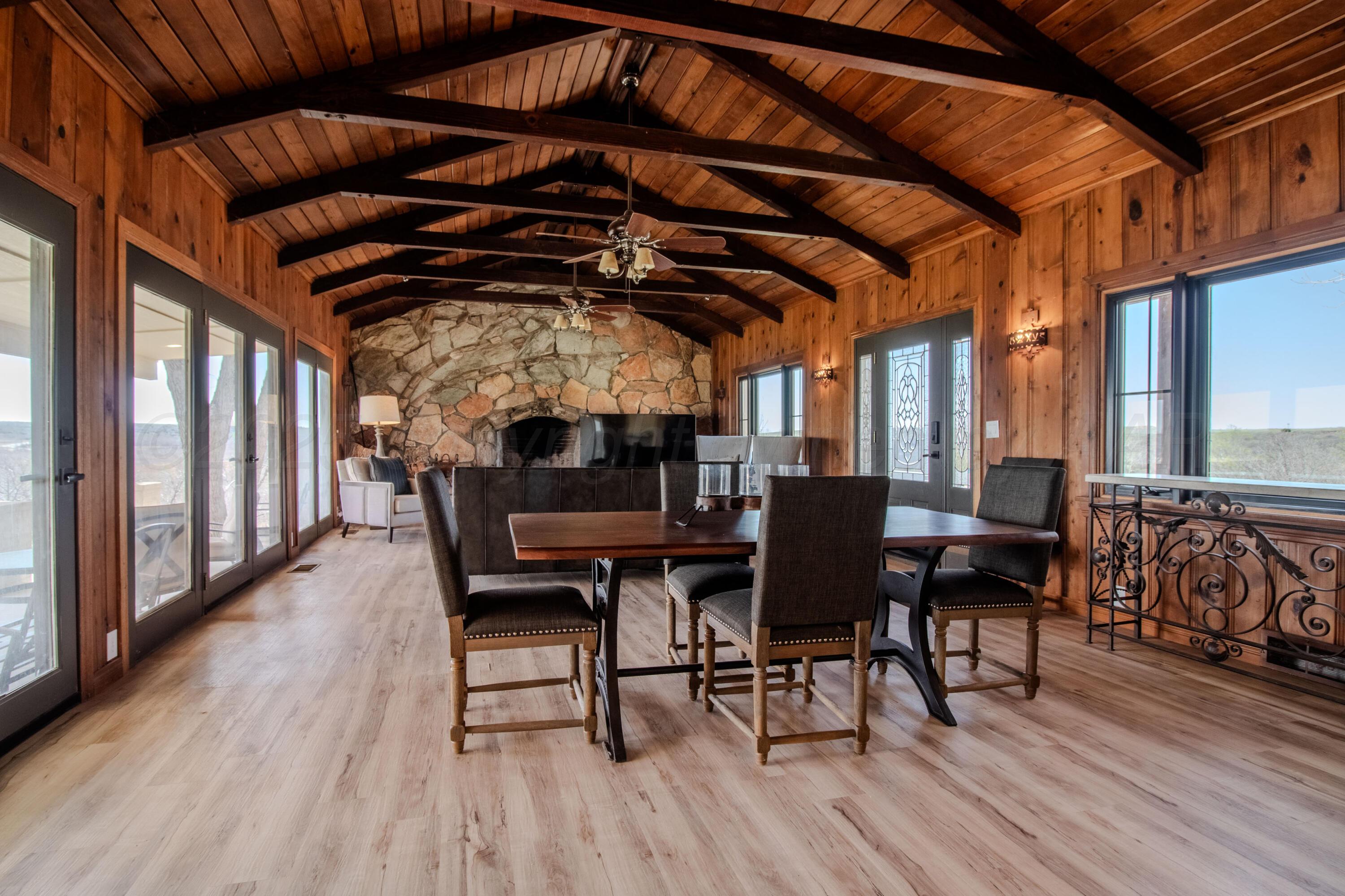 401 10 Bears Trail Howardwick, TX 79226 - Photo 5 of 71 a view of a dining room with furniture and wooden floor