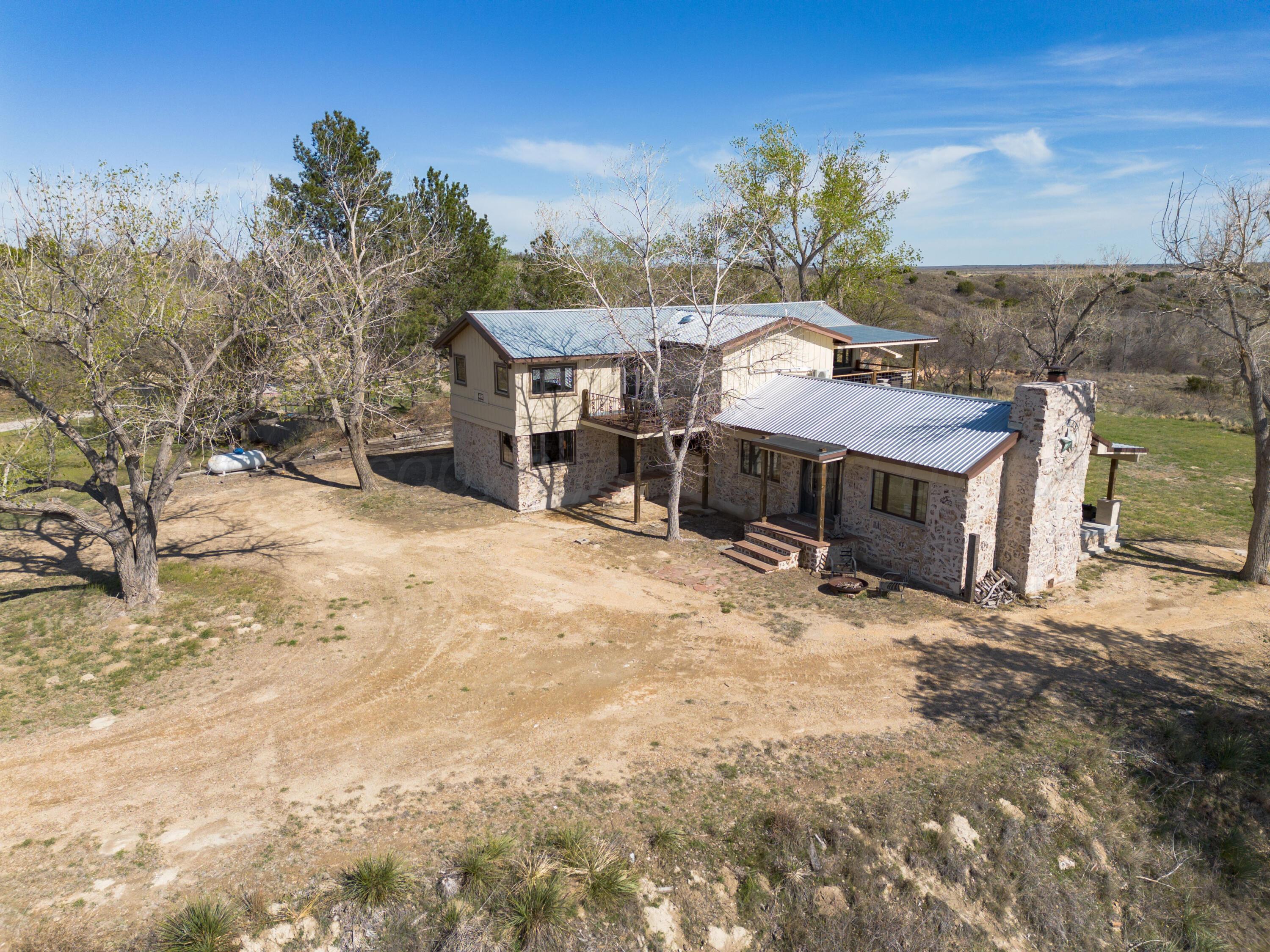 401 10 Bears Trail Howardwick, TX 79226 - Photo 53 of 71 a view of a house with a yard