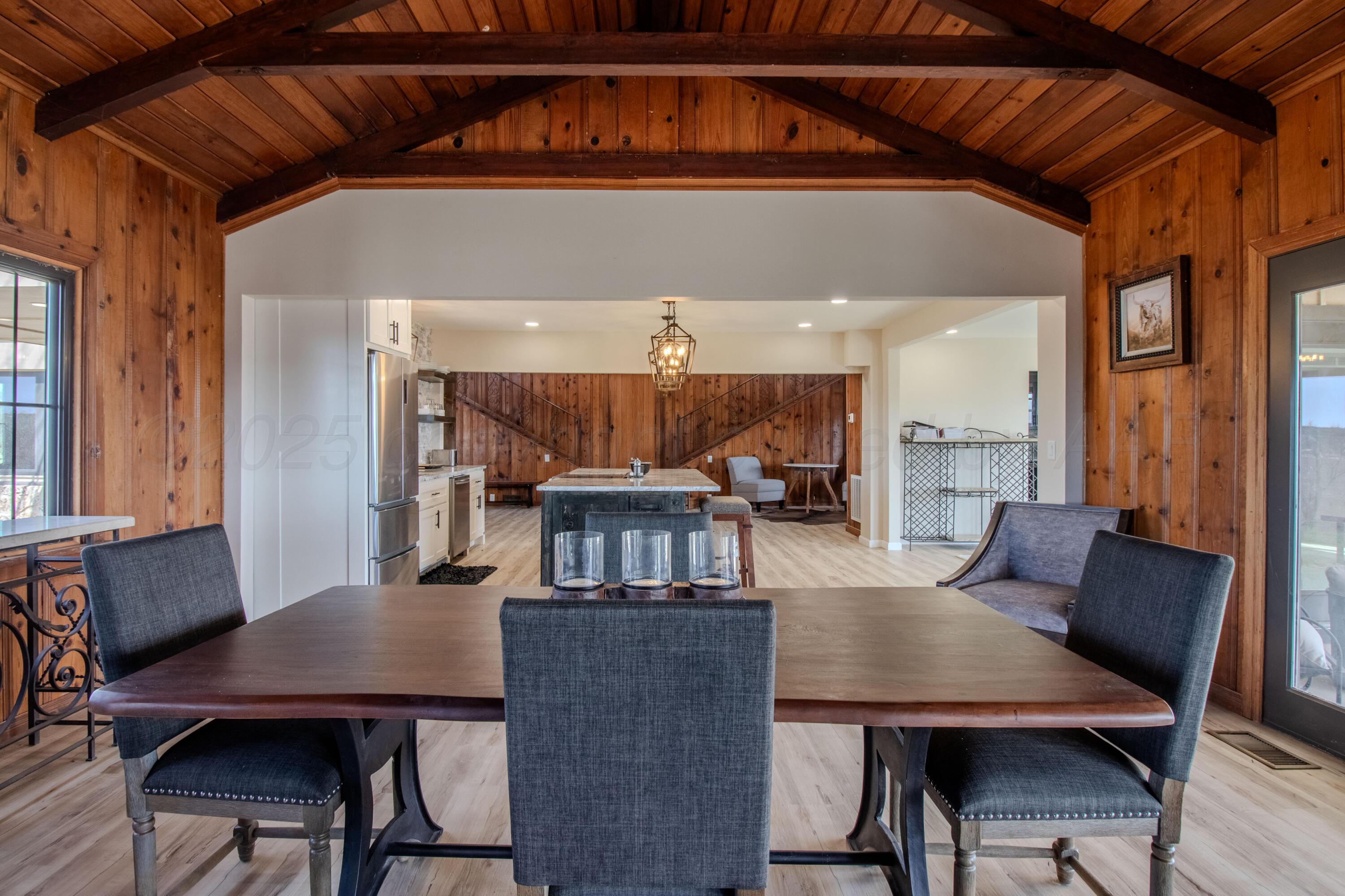 401 10 Bears Trail Howardwick, TX 79226 - Photo 10 of 71 a view of a dining room with furniture and a window