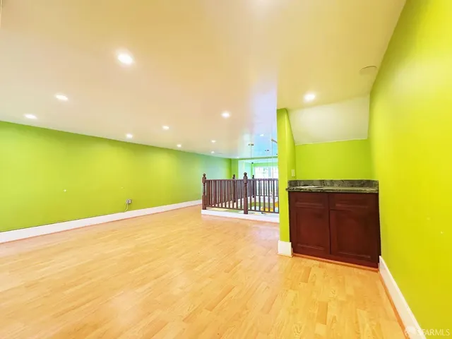 a view of a balcony with a swimming pool
