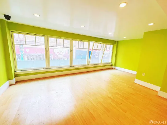 a view of a swimming pool with an outdoor space and seating area