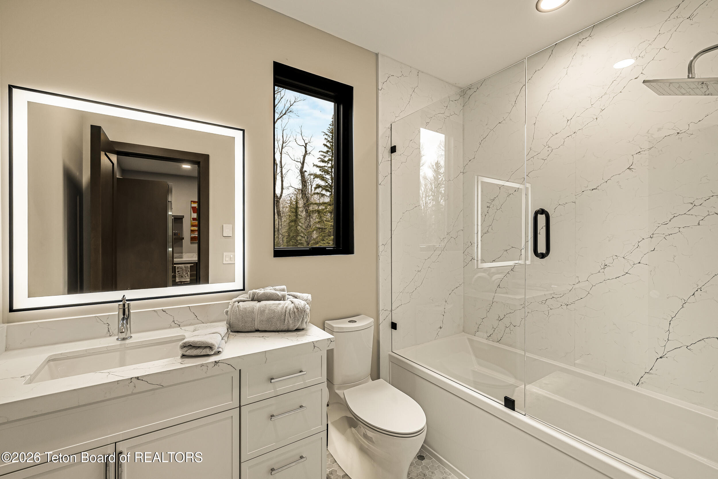 8910 Porter Loop Road Jackson, WY 83001 - Photo 64 of 85 Full Bathroom with Slabs