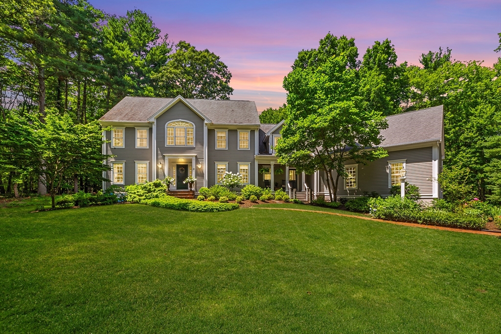 28 Broken Tree Road Medway, MA 02053 - Photo 1 of 42 a front view of a house with swimming pool having outdoor seating