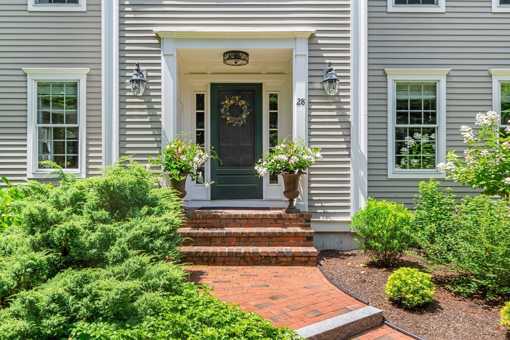 28 Broken Tree Road Medway, MA 02053 - Photo 3 of 42 a view of a house with potted plants