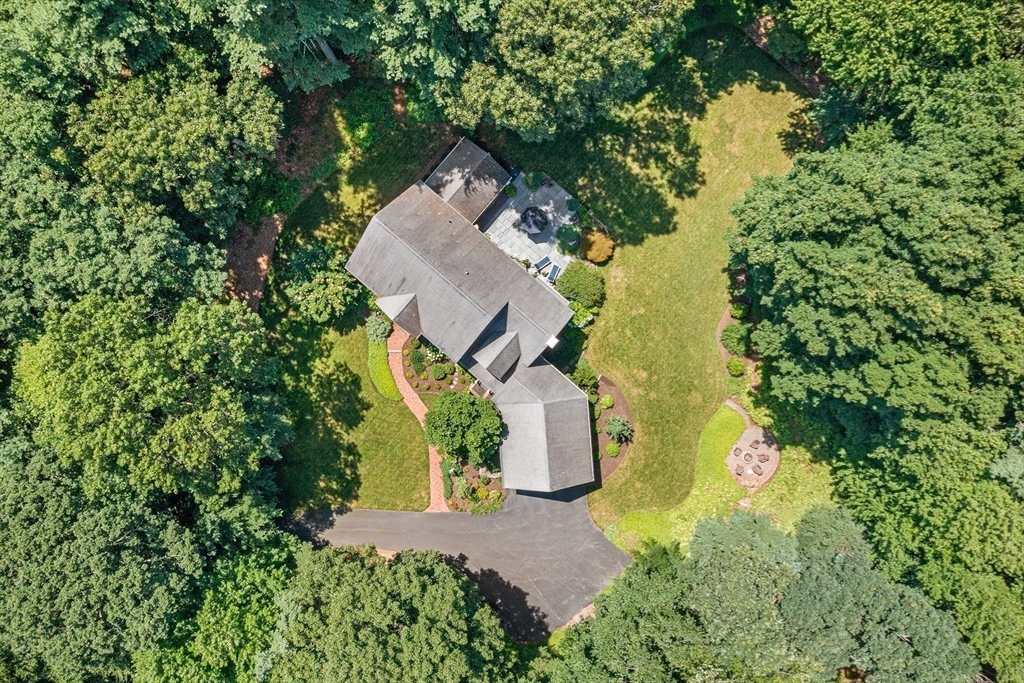 28 Broken Tree Road Medway, MA 02053 - Photo 41 of 42 an aerial view of a house with a yard and a large tree